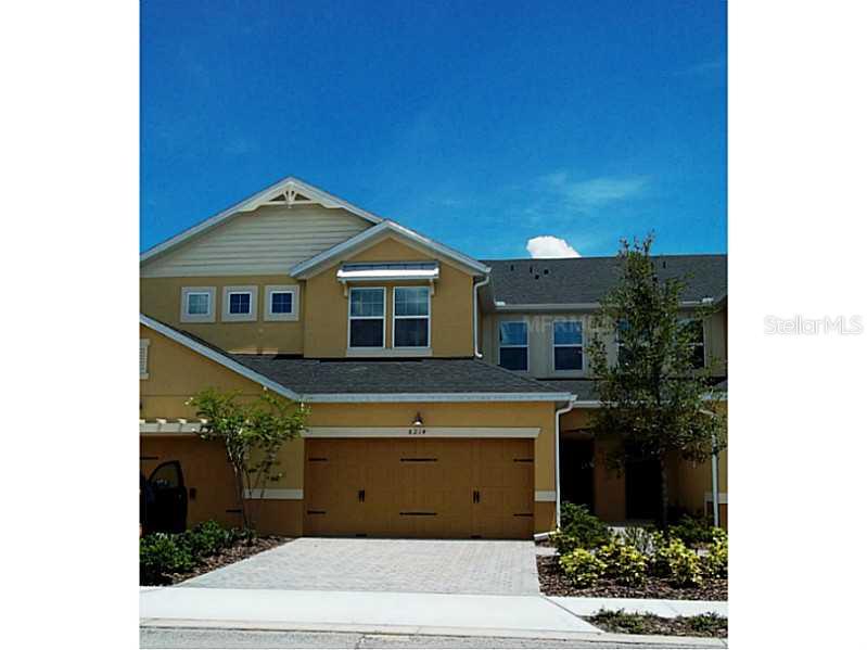 8214 Mystic View Way Windermere, FL 34786 - Photo 1 of 1 a front view of a house with a yard