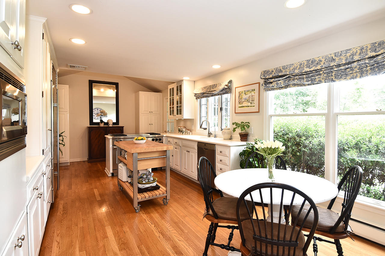 22 Country Club Road New Canaan, CT 06840 - Photo 11 of 47 a dining room with furniture window and wooden floor