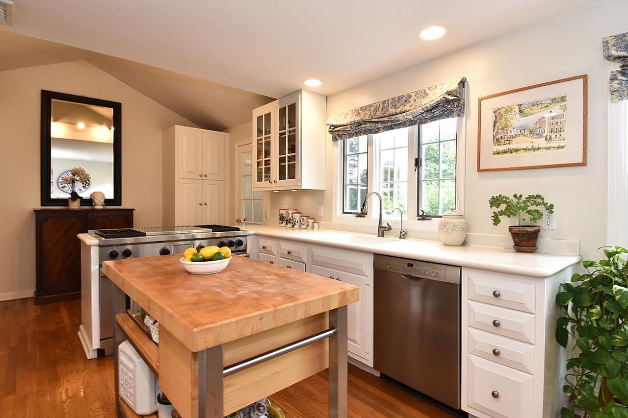 22 Country Club Road New Canaan, CT 06840 - Photo 13 of 47 a kitchen with a stove a sink and a refrigerator