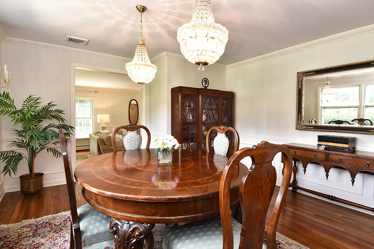 22 Country Club Road New Canaan, CT 06840 - Photo 17 of 47 a view of a dining room with furniture