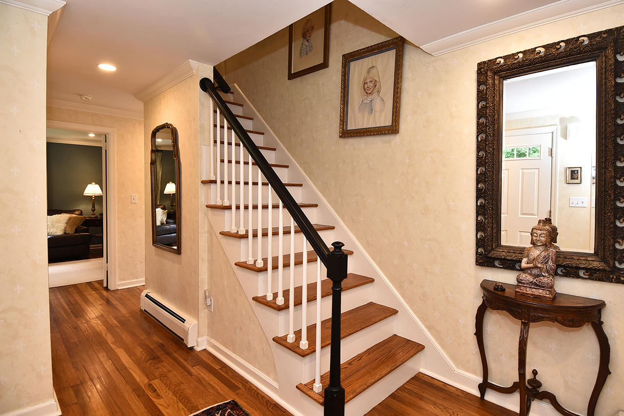 22 Country Club Road New Canaan, CT 06840 - Photo 3 of 47 a view of entryway and hall with wooden floor