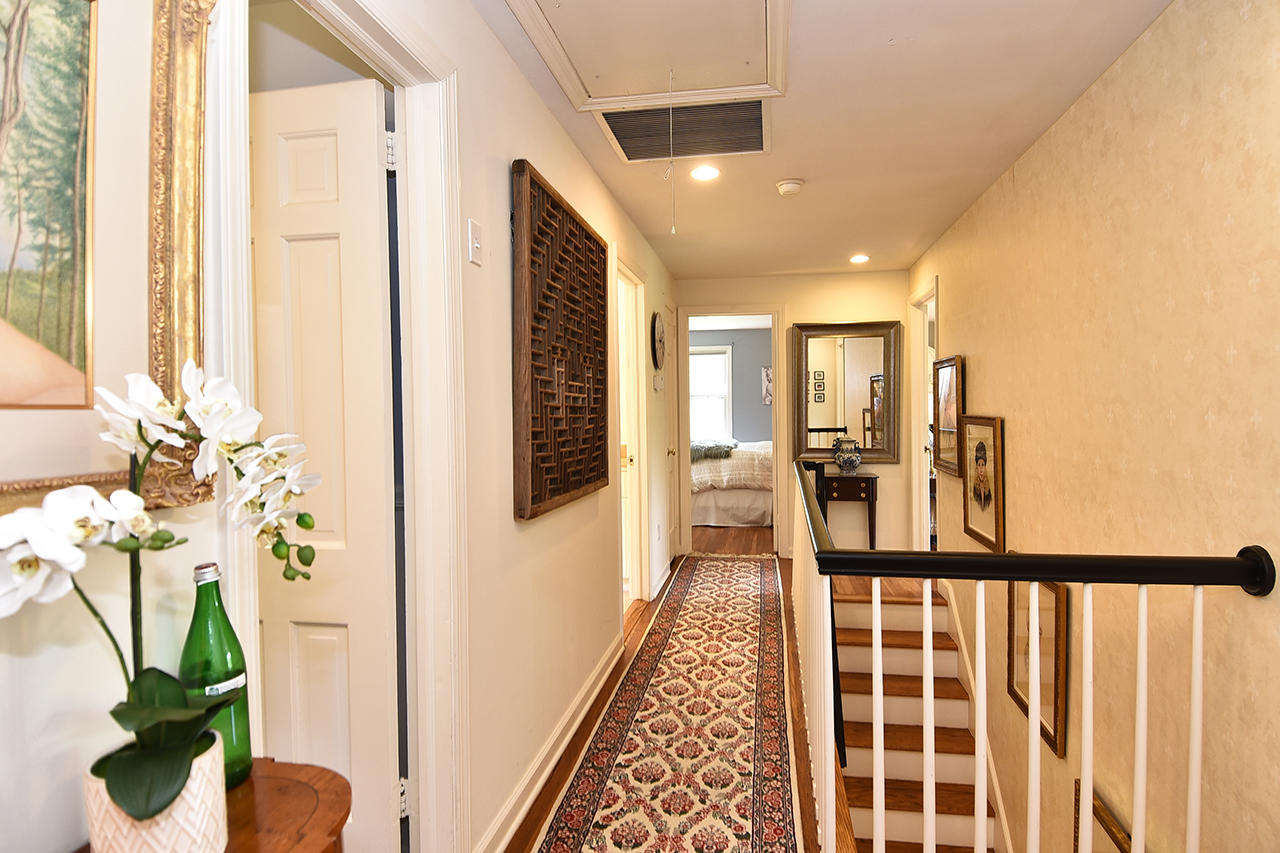 22 Country Club Road New Canaan, CT 06840 - Photo 24 of 47 a view of a hallway with wooden floor