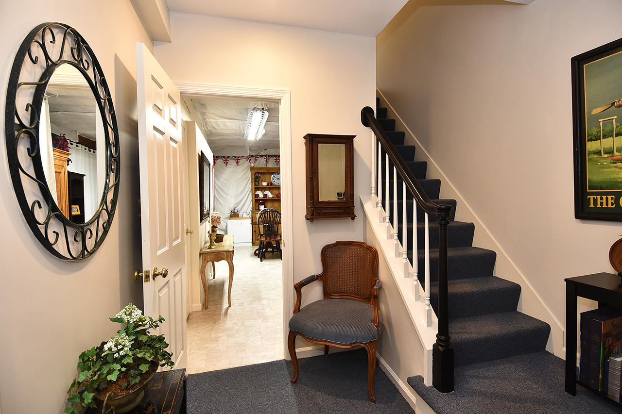 22 Country Club Road New Canaan, CT 06840 - Photo 35 of 47 a view of entryway and hall with wooden floor