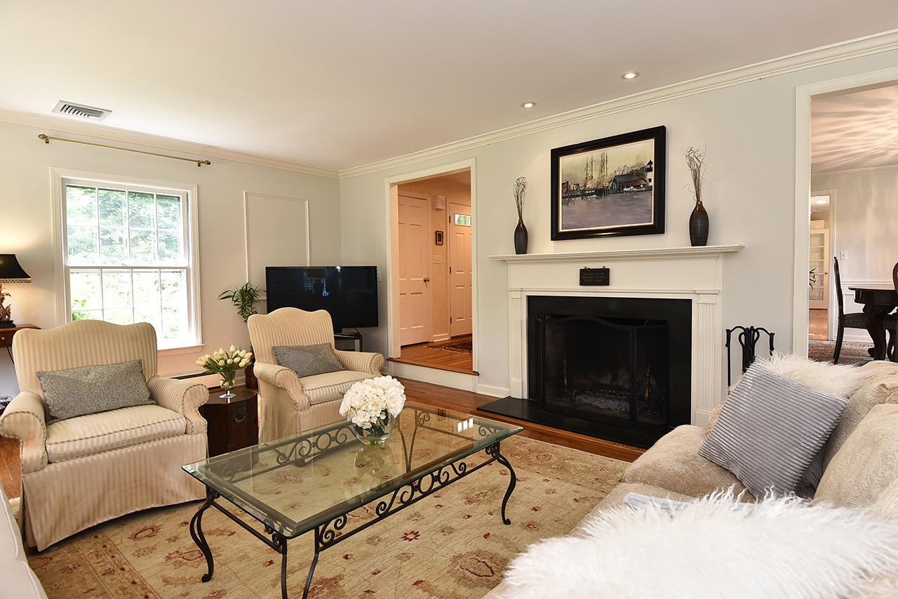 22 Country Club Road New Canaan, CT 06840 - Photo 6 of 47 a living room with furniture and a fireplace