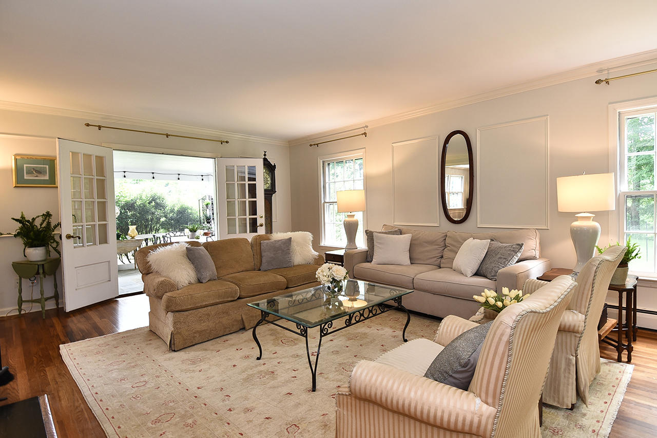 22 Country Club Road New Canaan, CT 06840 - Photo 7 of 47 a living room with furniture fireplace and a large window