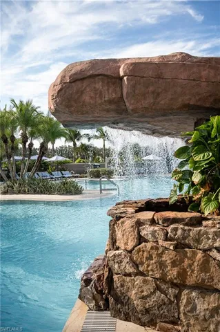a view of a fountain in front of house