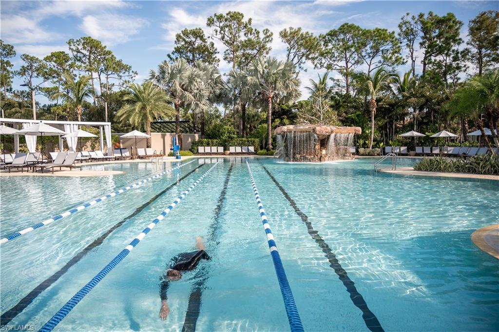 2087 Rivoli Court Naples, FL 34105 - Photo 32 of 37 a view of a swimming pool with a patio