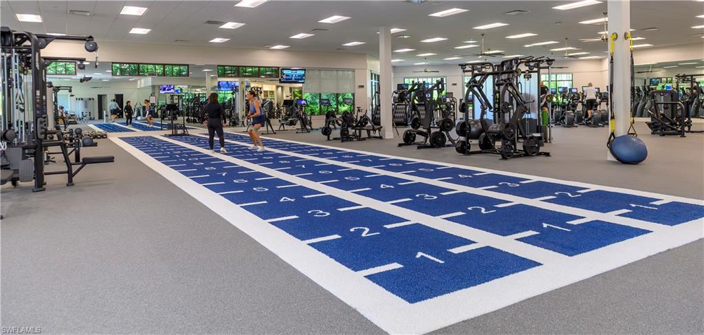 2087 Rivoli Court Naples, FL 34105 - Photo 34 of 37 a view of a room with gym equipment