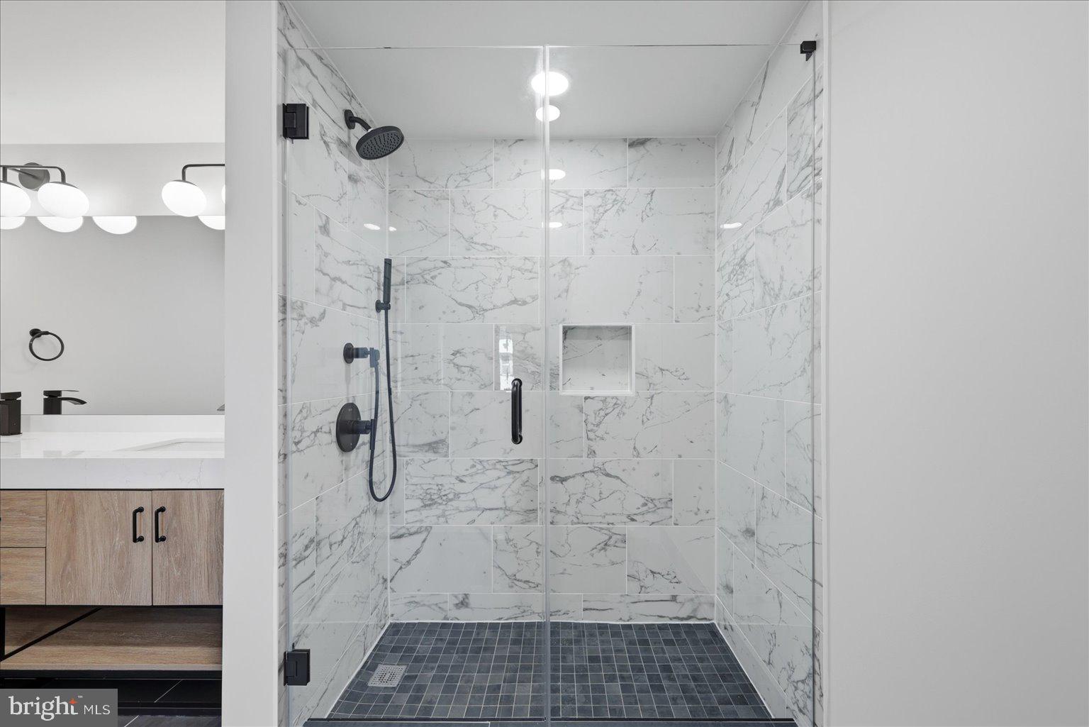 919 12th Street Northeast, Unit 303 Washington, DC 20002 - Photo 11 of 22 a bathroom with a shower