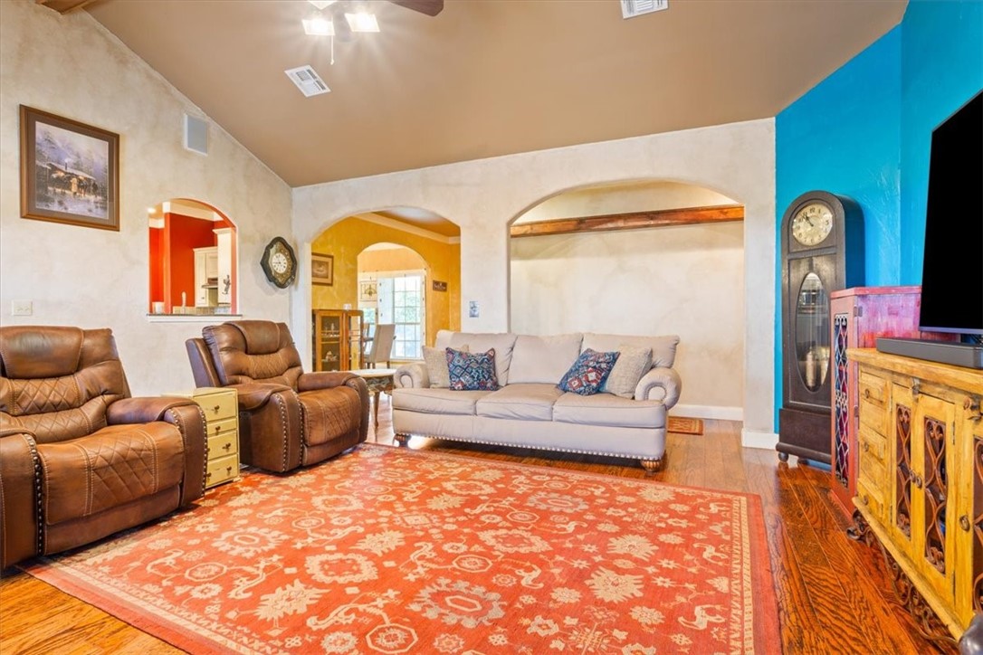 551 Bottoms East Road Temple, TX 76501 - Photo 17 of 44 a living room with furniture a rug and a large window
