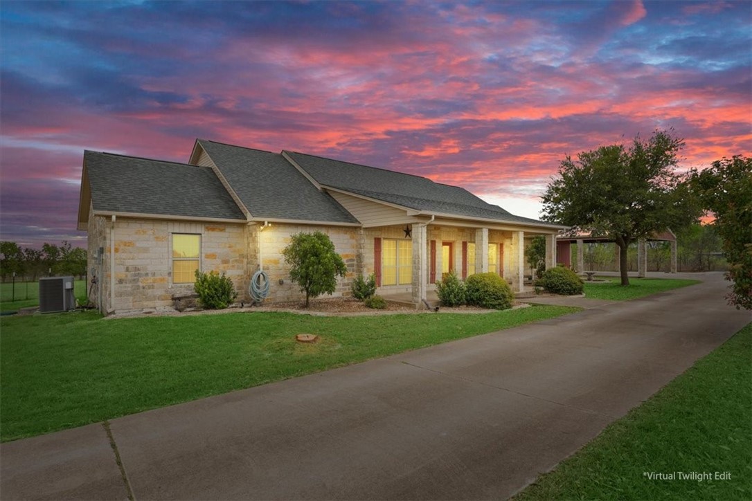 551 Bottoms East Road Temple, TX 76501 - Photo 2 of 44 a front view of a house with a yard and garage