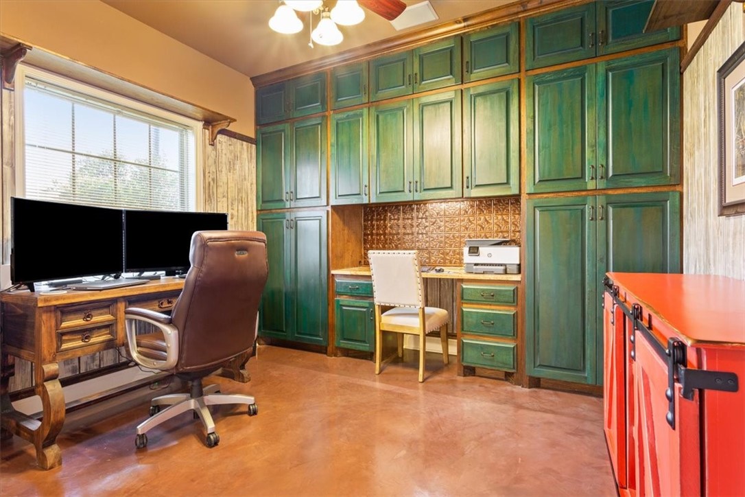 551 Bottoms East Road Temple, TX 76501 - Photo 27 of 44 a view of a workspace with furniture and a window