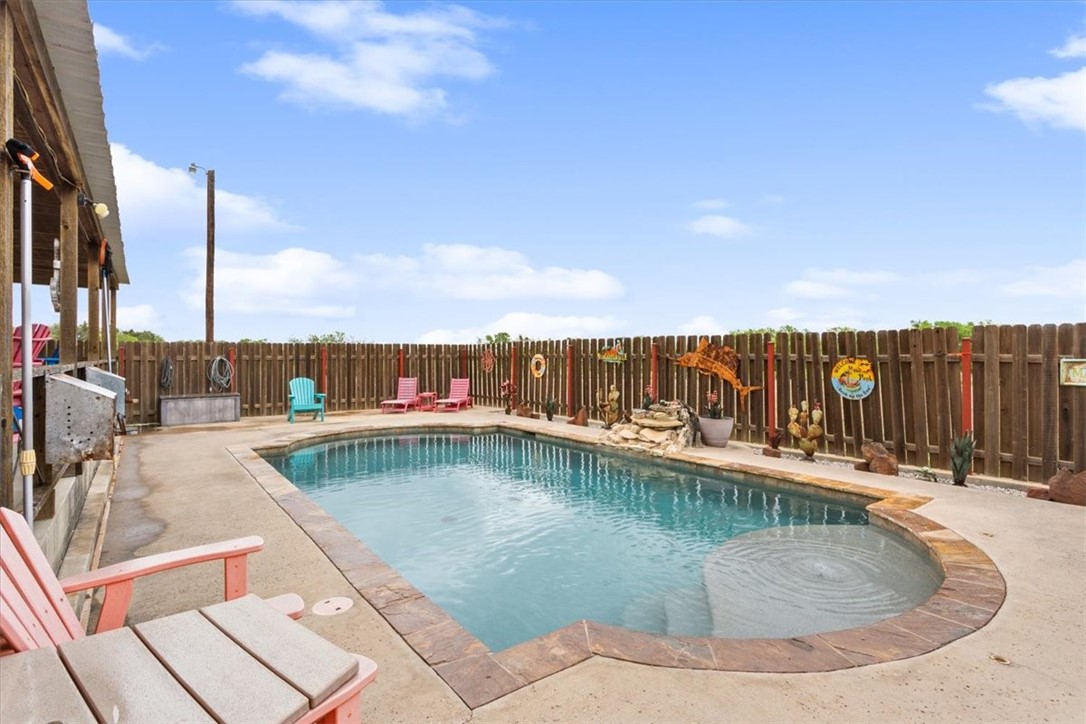 551 Bottoms East Road Temple, TX 76501 - Photo 38 of 44 a view of a swimming pool with a lounge chairs