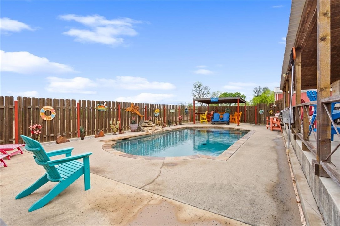 551 Bottoms East Road Temple, TX 76501 - Photo 40 of 44 swimming pool view with a garden space