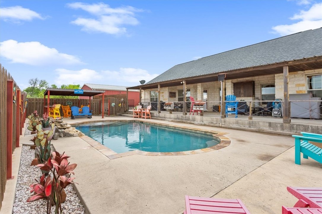 551 Bottoms East Road Temple, TX 76501 - Photo 42 of 44 a view of a swimming pool with outdoor seating