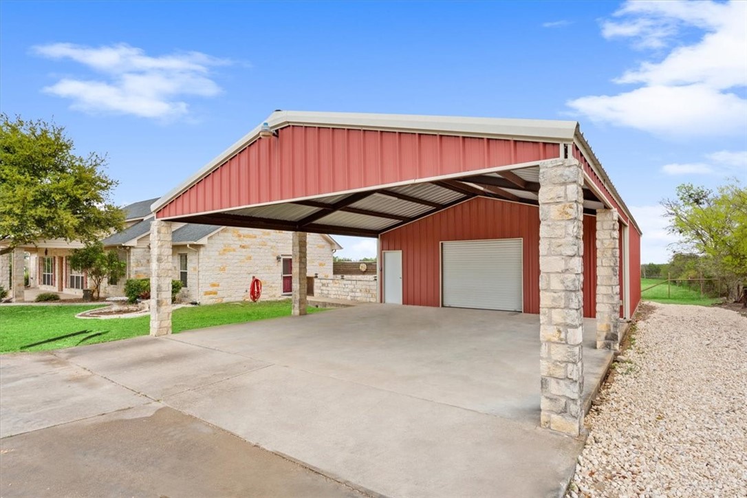 551 Bottoms East Road Temple, TX 76501 - Photo 5 of 44 a view of a house with a yard and garage