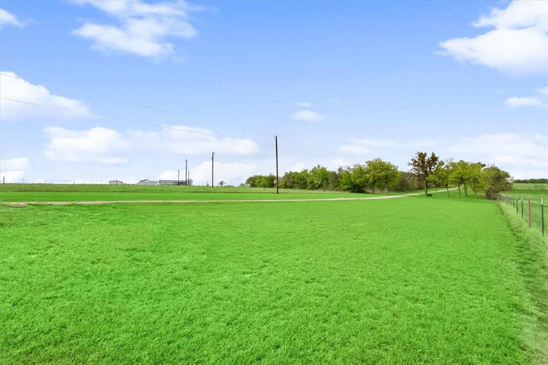 551 Bottoms East Road Temple, TX 76501 - Photo 7 of 44 a backyard of a house with lots of green space