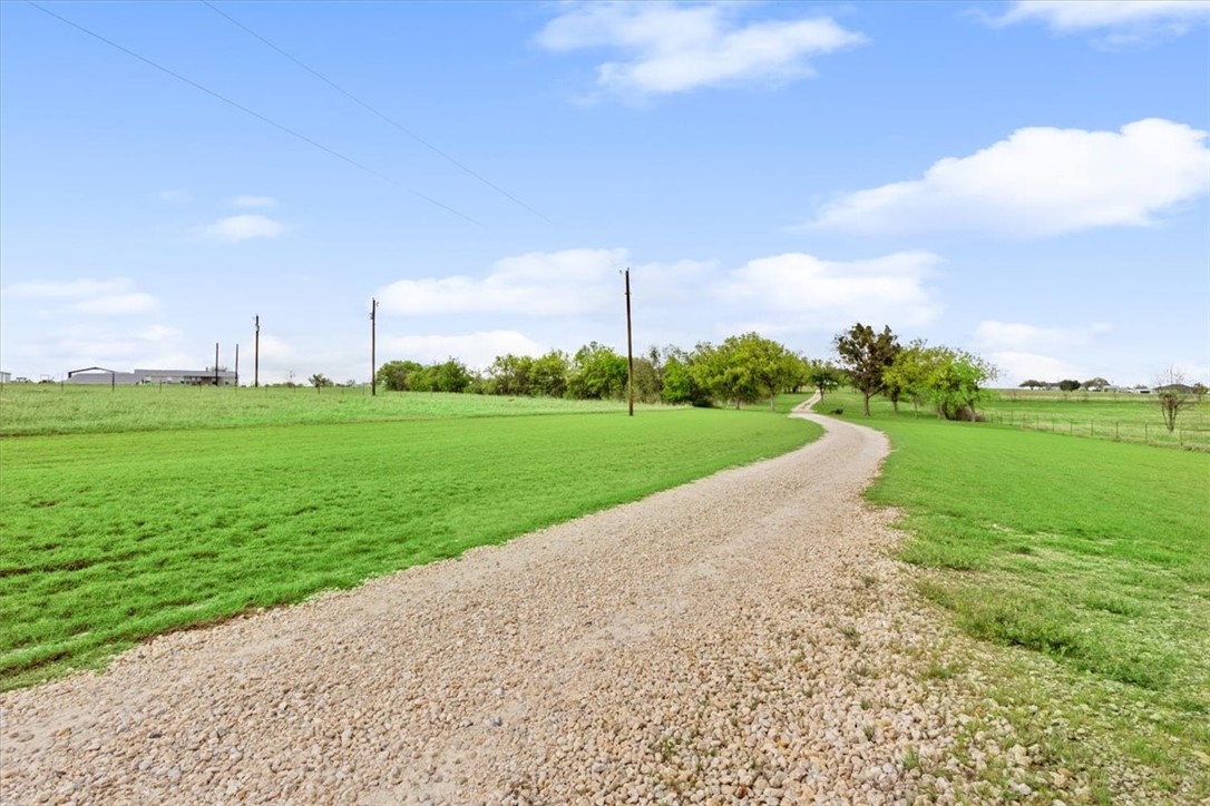 551 Bottoms East Road Temple, TX 76501 - Photo 8 of 44 a view of a park with large trees and a big yard