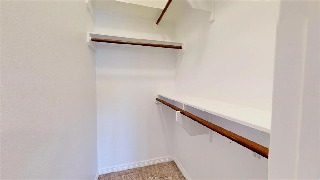 1198 Jones-Butler Road, Unit 2607 College Station, TX 77840 - Photo 14 of 20 a view of staircase with white walls