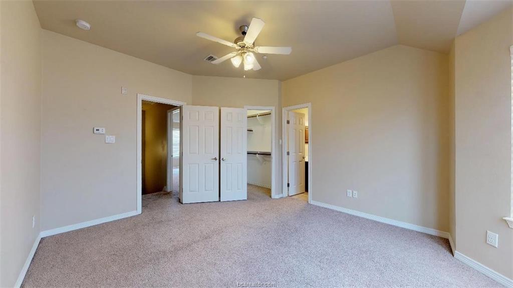 1198 Jones-Butler Road, Unit 2607 College Station, TX 77840 - Photo 19 of 20 a view of an empty room with a ceiling fan