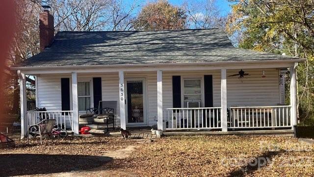 3630 Mt Holly Road Edgemoor, SC 29712 - Photo 1 of 25 a front view of a house with iron fence