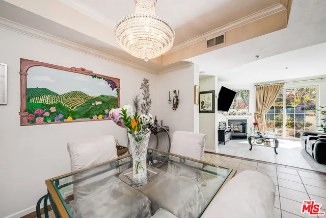 a spacious bedroom with a bed and a desk