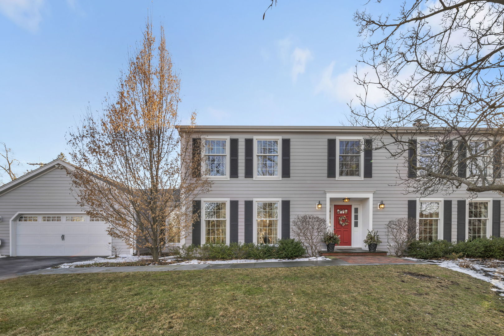 a front view of building with yard