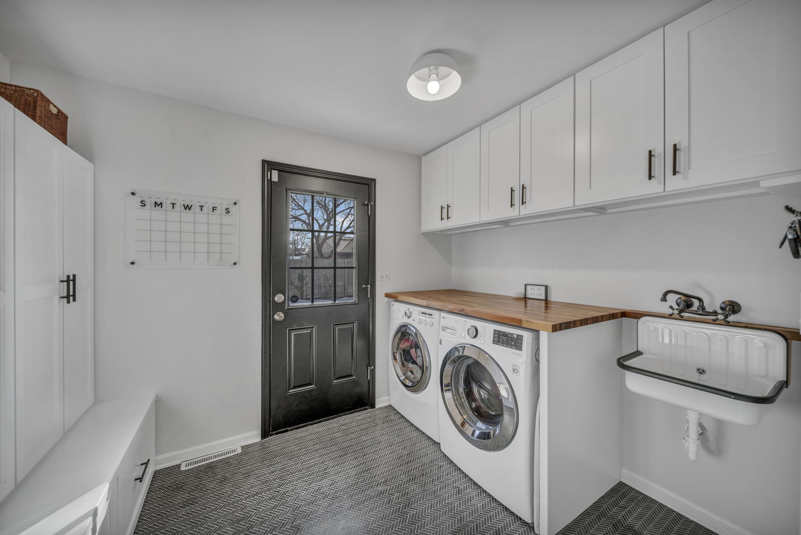 1810 Wagner Road Glenview, IL 60025 - Photo 12 of 32 a utility room with sink dryer and washer