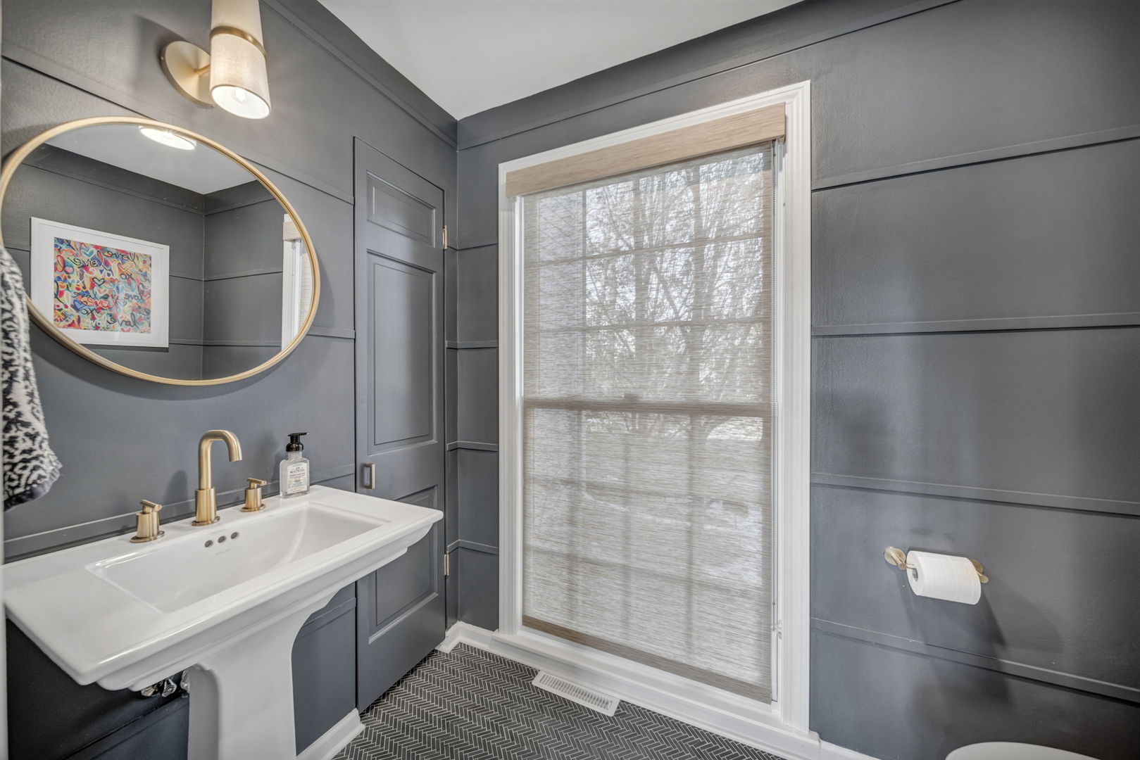 1810 Wagner Road Glenview, IL 60025 - Photo 13 of 32 a bathroom with a sink and a mirror