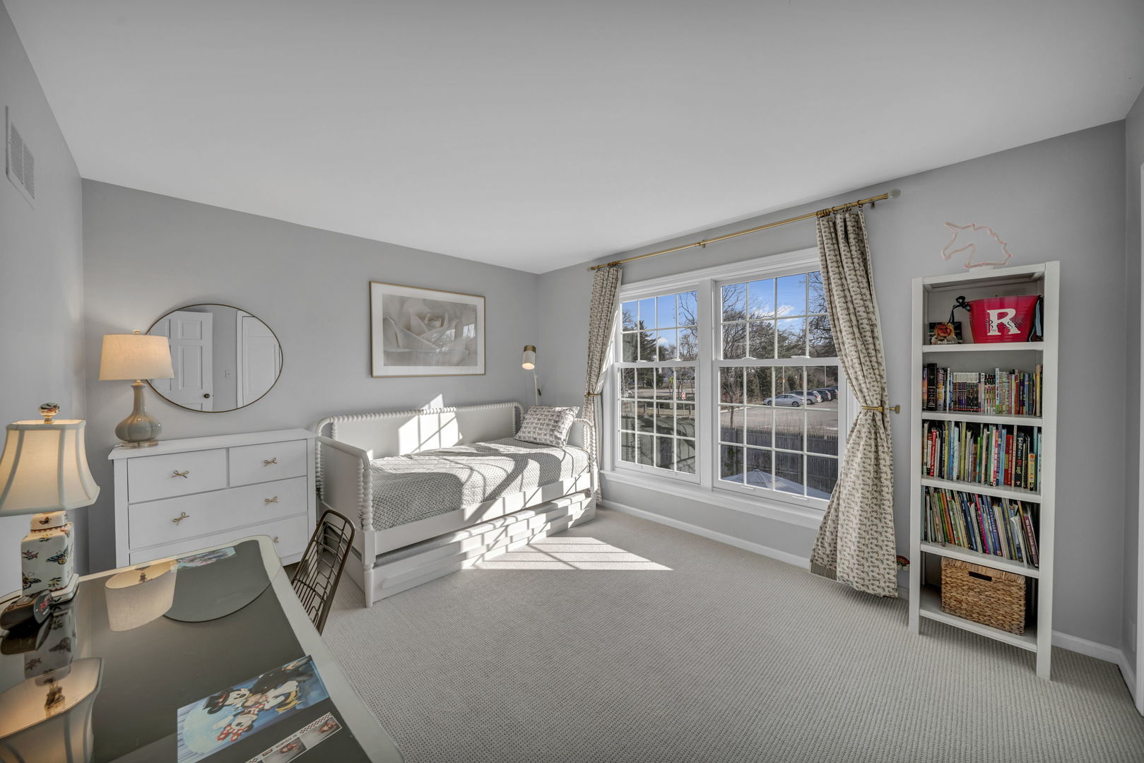 1810 Wagner Road Glenview, IL 60025 - Photo 17 of 32 a living room with furniture a rug cabinet and a bookshelf