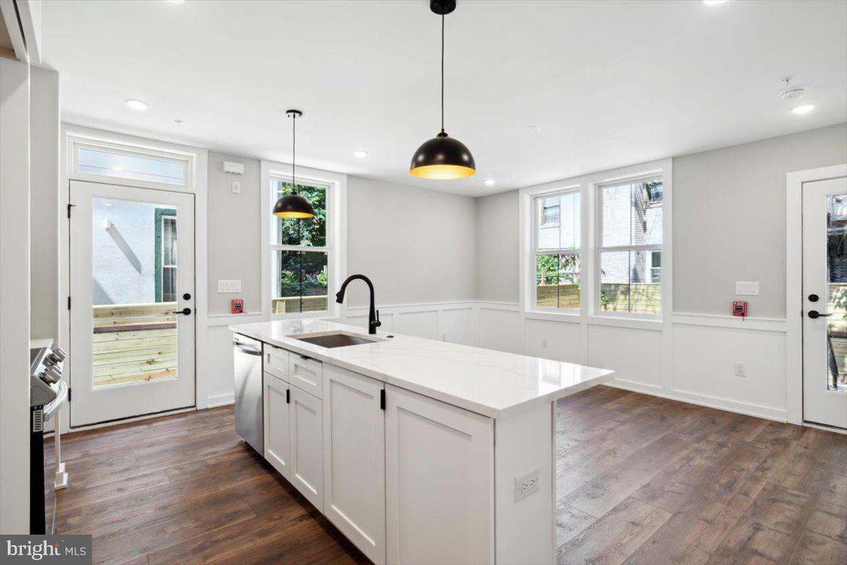 3519 Hamilton Street, Unit A Philadelphia, PA 19104 - Photo 19 of 47 a kitchen with a sink stove and cabinets