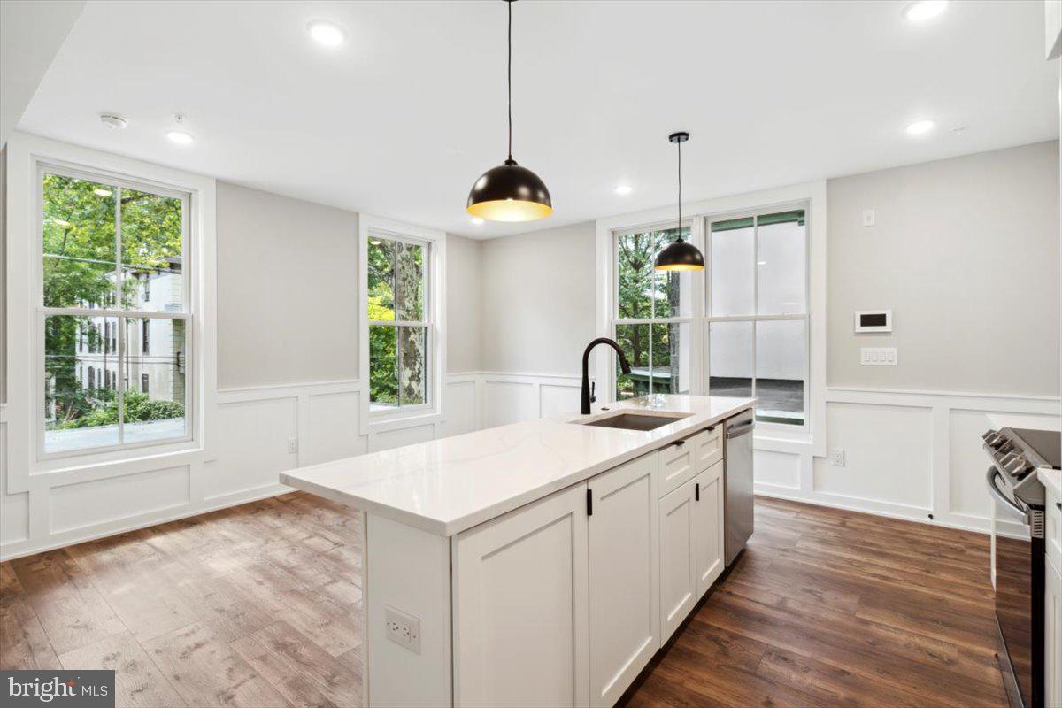 3519 Hamilton Street, Unit A Philadelphia, PA 19104 - Photo 30 of 47 a kitchen with a sink and a stove