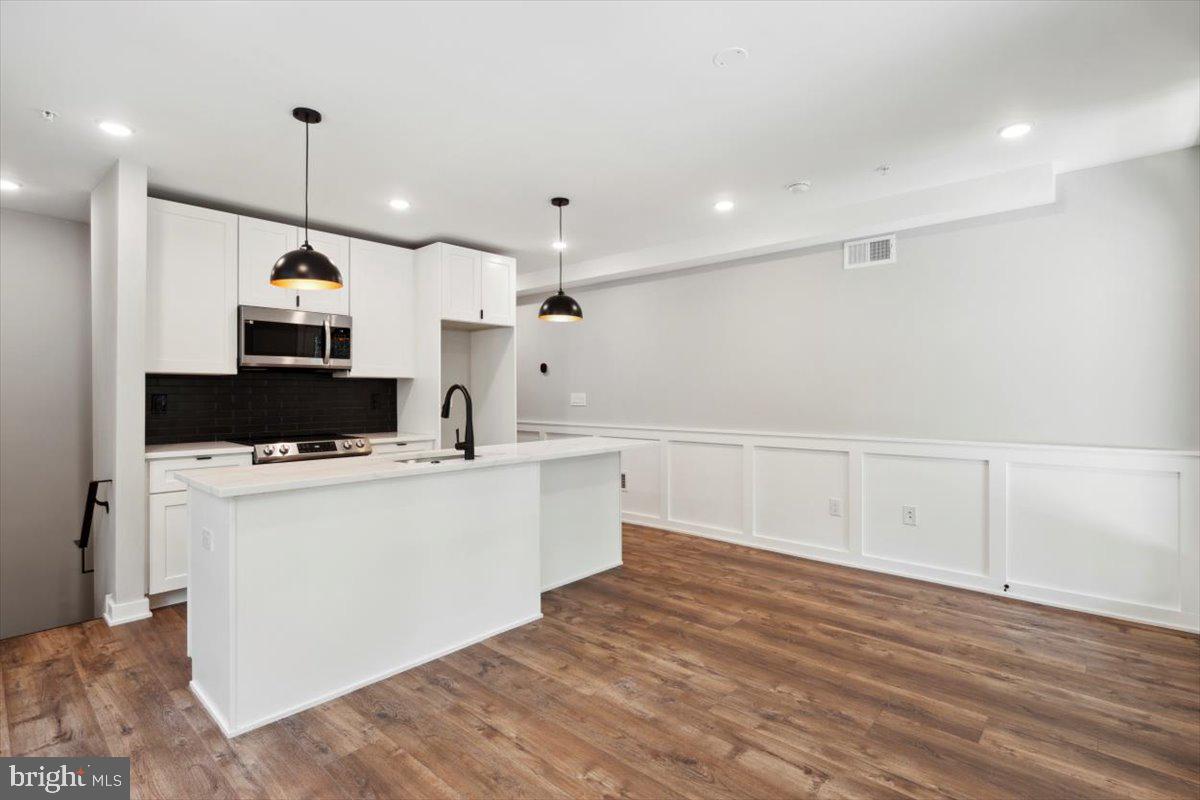 3519 Hamilton Street, Unit A Philadelphia, PA 19104 - Photo 5 of 47 a living room with furniture and a wooden floor