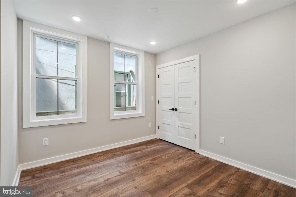 3519 Hamilton Street, Unit A Philadelphia, PA 19104 - Photo 8 of 47 an empty room with windows and closet