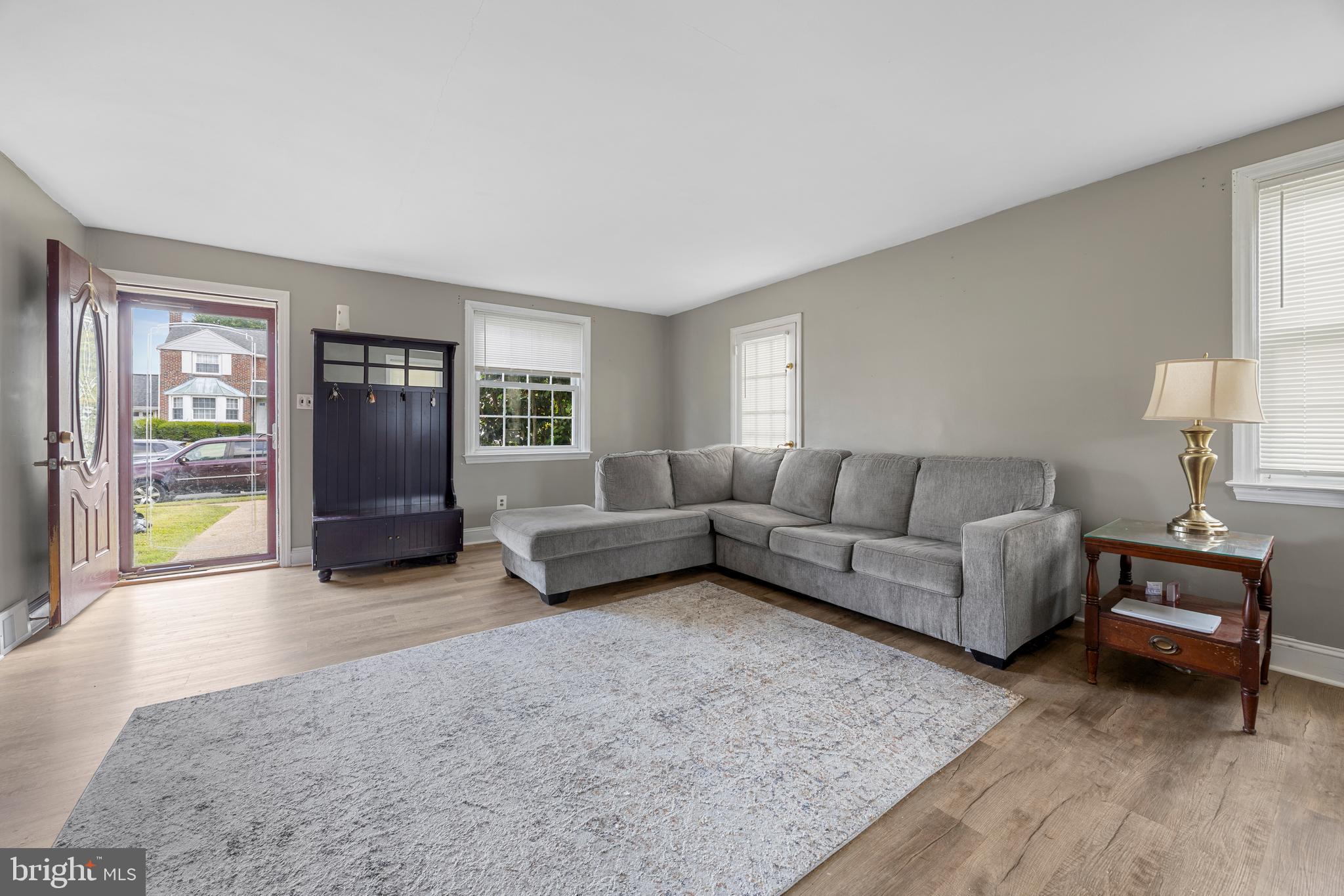 511 Rodney Lane Springfield, PA 19064 - Photo 5 of 23 a living room with furniture and a lamp