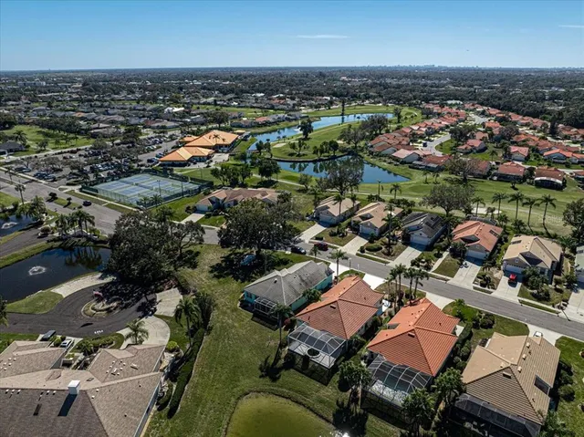 an aerial view of a city with lots of residential buildings