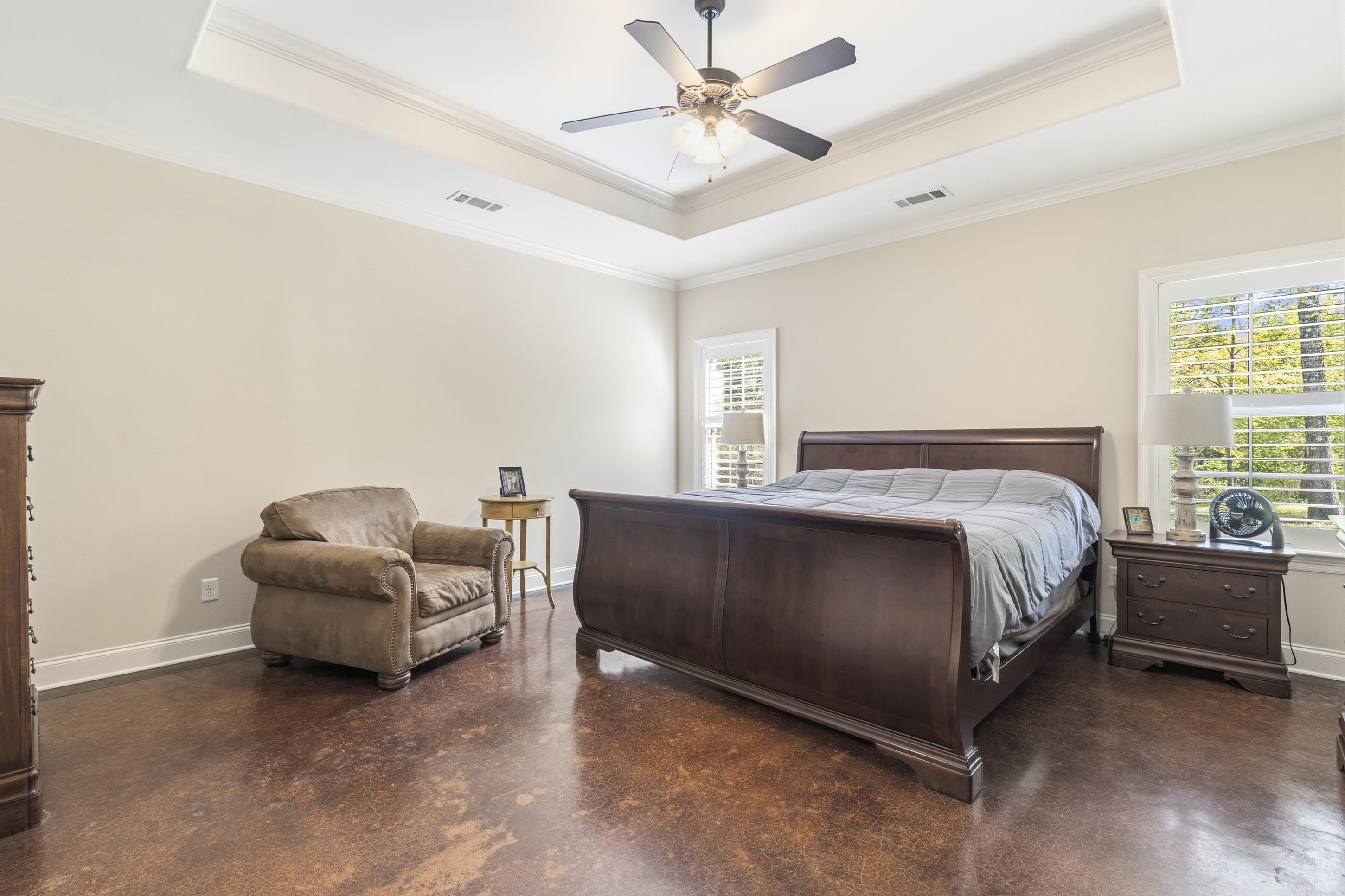 1795 Gaines Road Hernando, MS 38632 - Photo 12 of 40 a bedroom with a bed and a couch