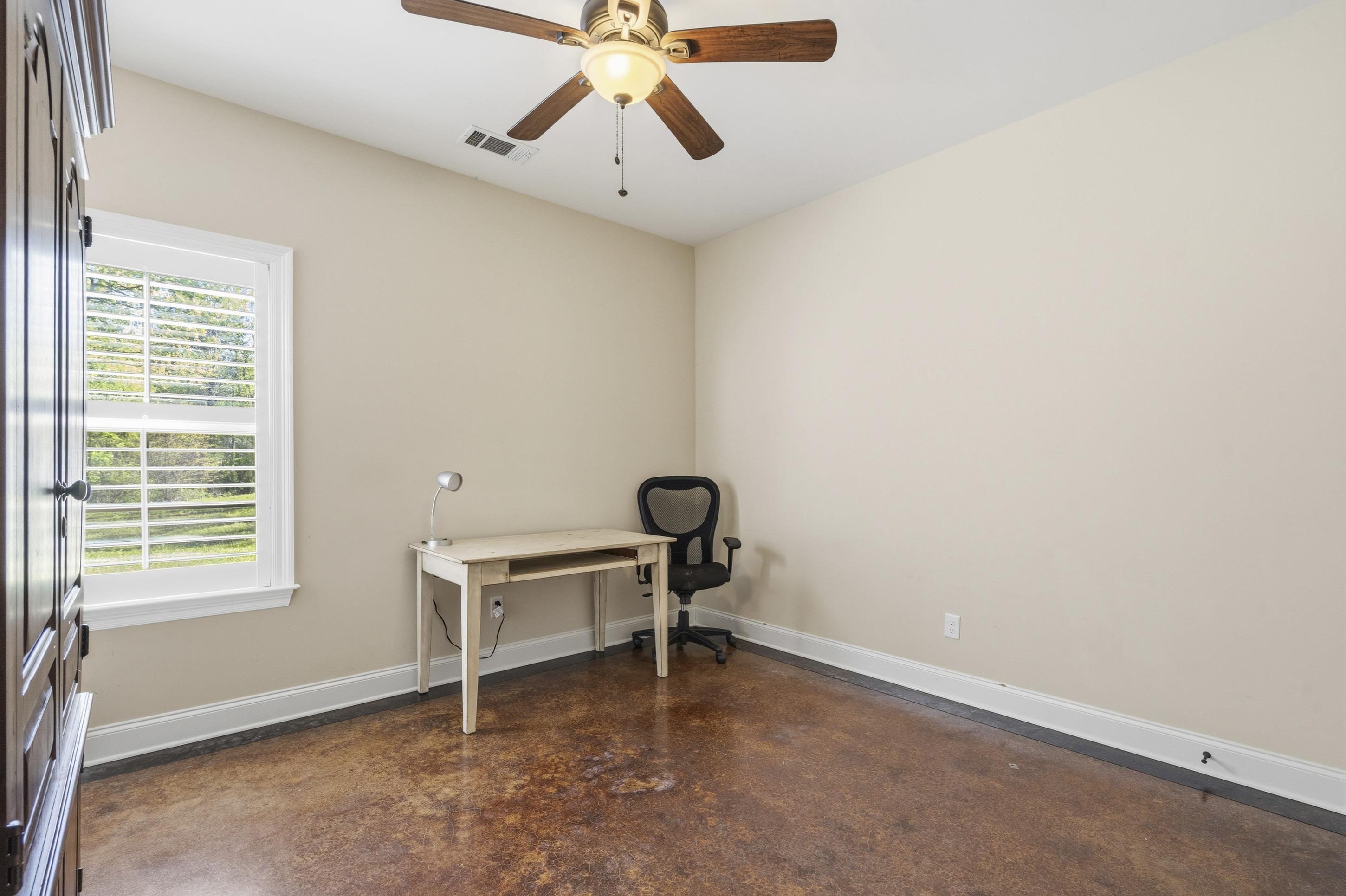 1795 Gaines Road Hernando, MS 38632 - Photo 19 of 40 a room with window and a ceiling fan