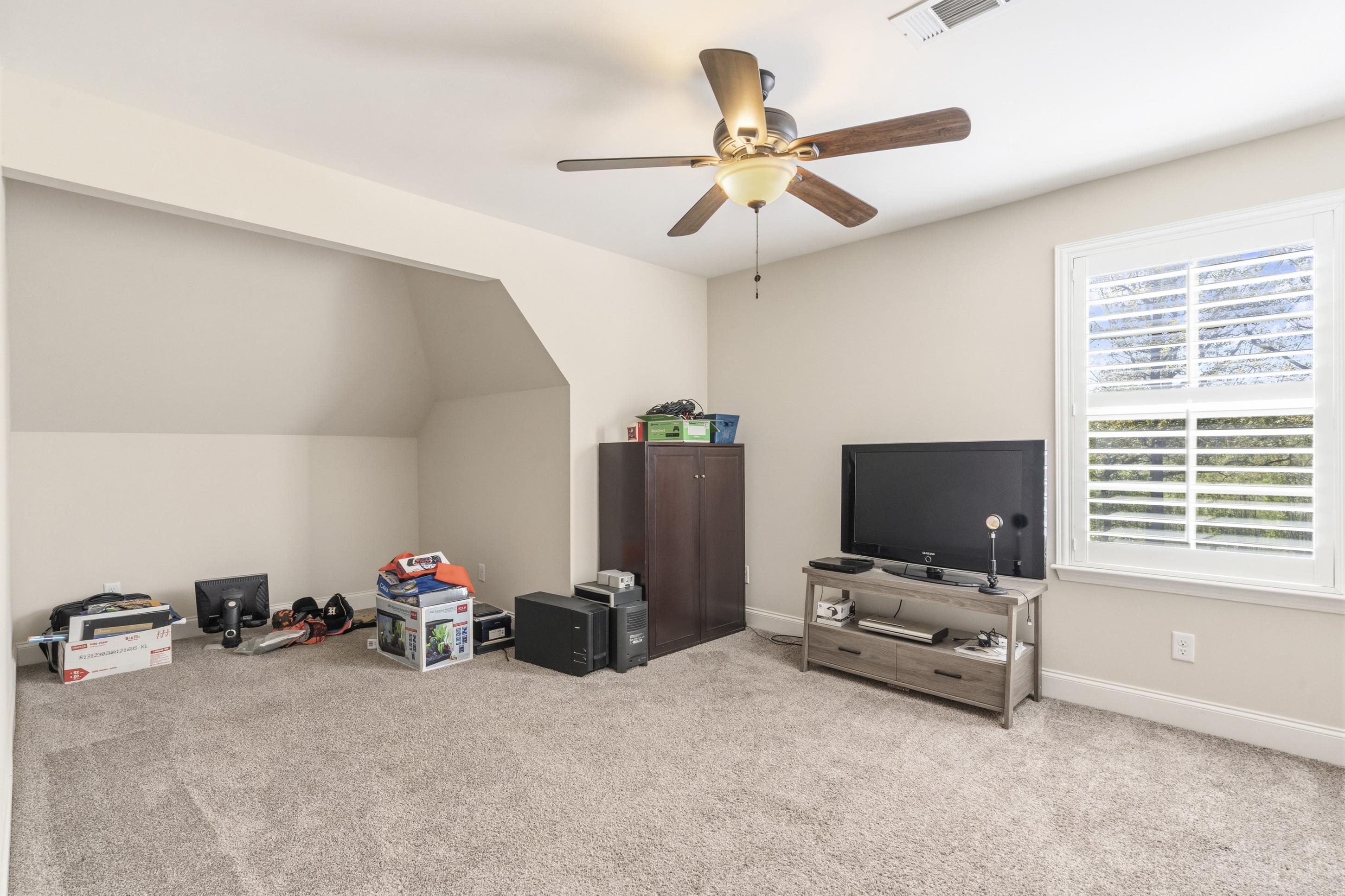 1795 Gaines Road Hernando, MS 38632 - Photo 25 of 40 a view of a workspace with furniture and a window