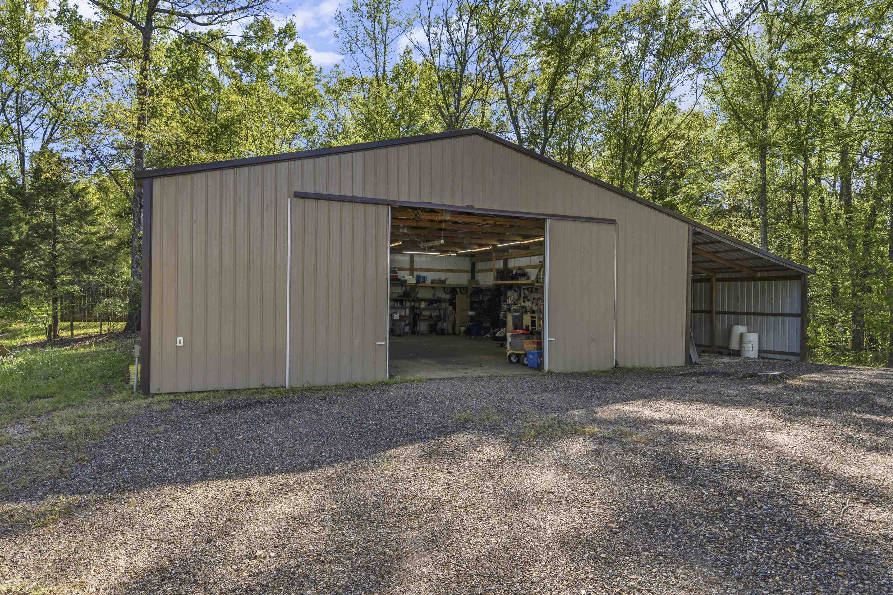 1795 Gaines Road Hernando, MS 38632 - Photo 27 of 40 a house with trees in the background
