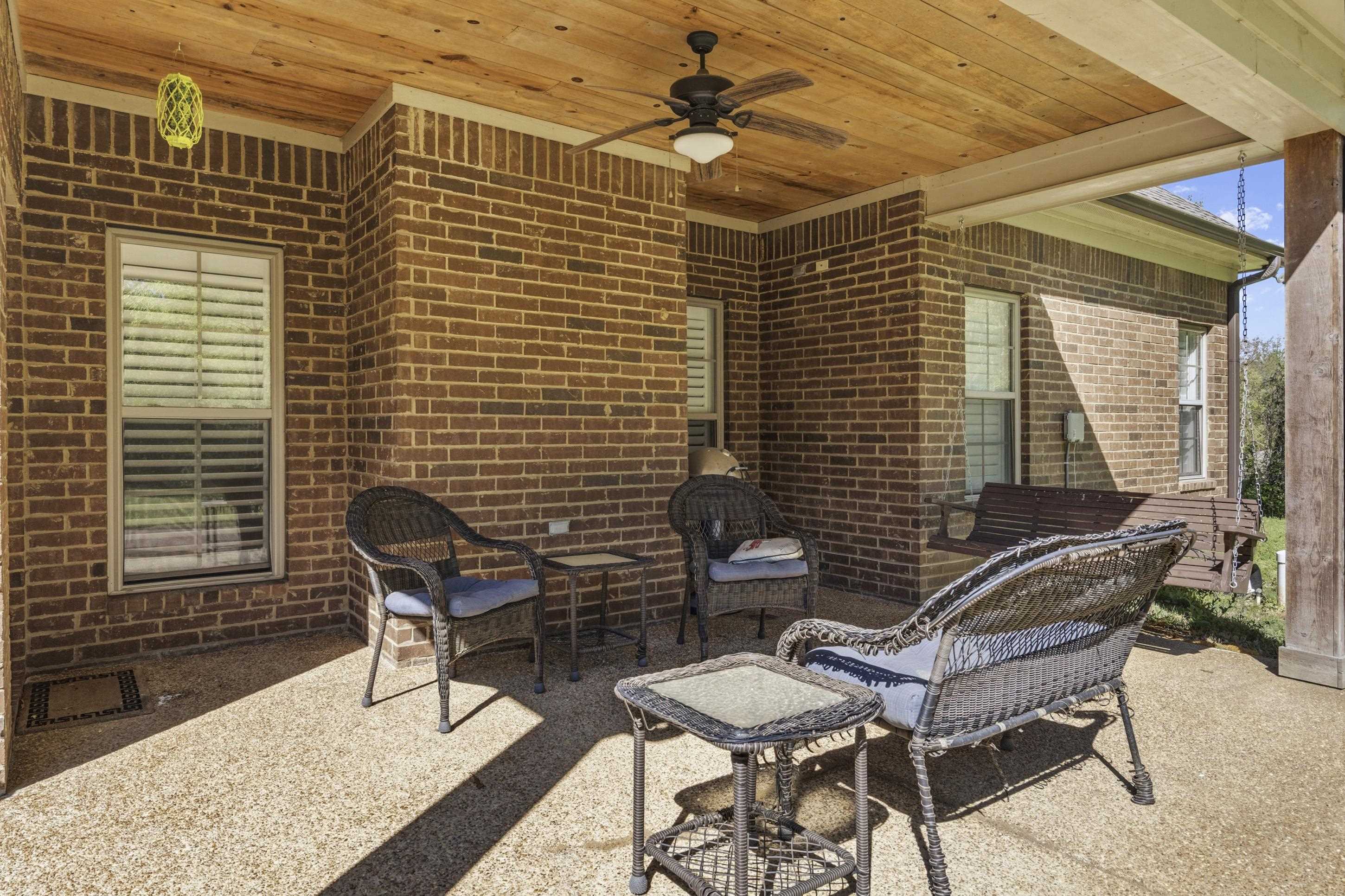 1795 Gaines Road Hernando, MS 38632 - Photo 33 of 40 a couple of chairs sitting in front of a house
