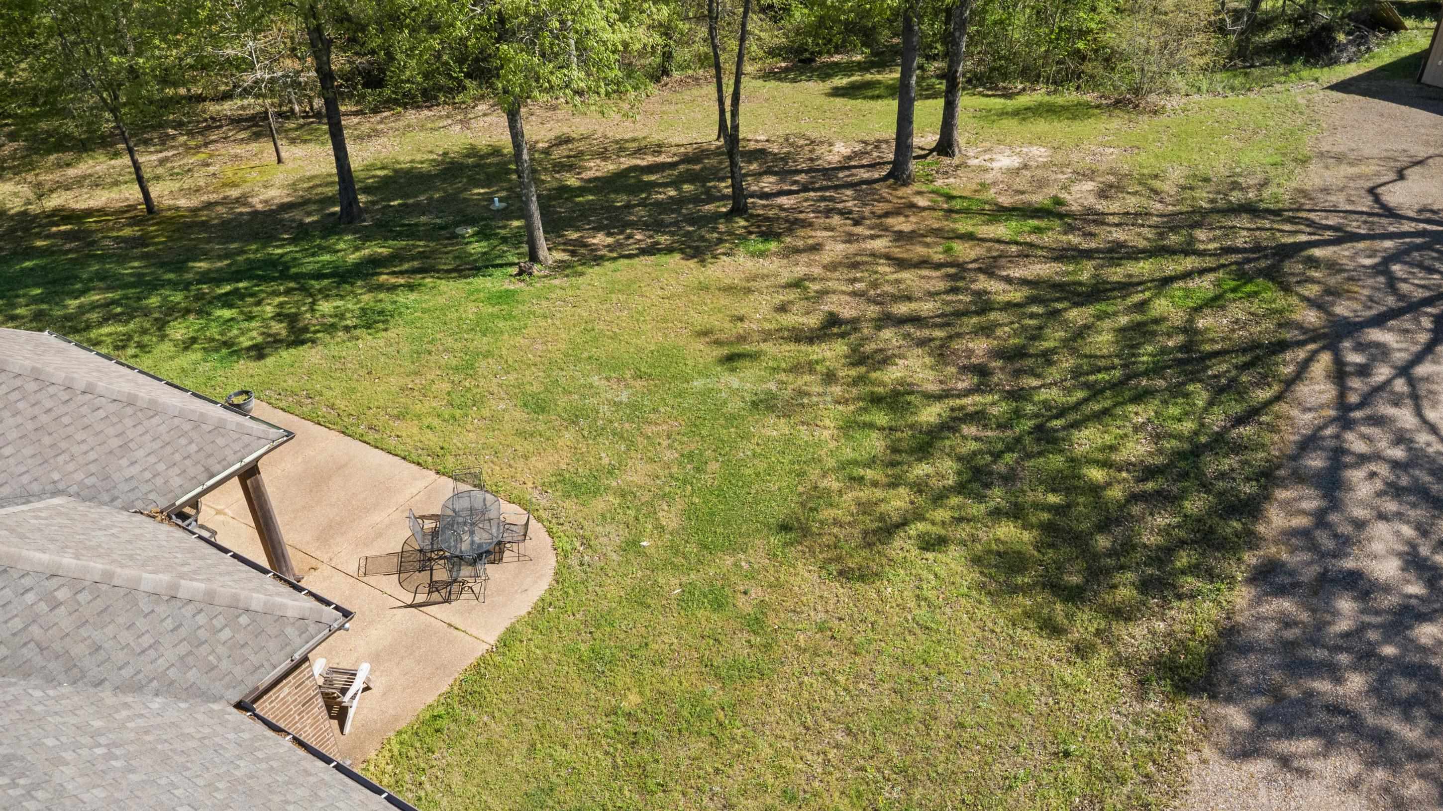 1795 Gaines Road Hernando, MS 38632 - Photo 36 of 40 a view of a swimming pool with a backyard