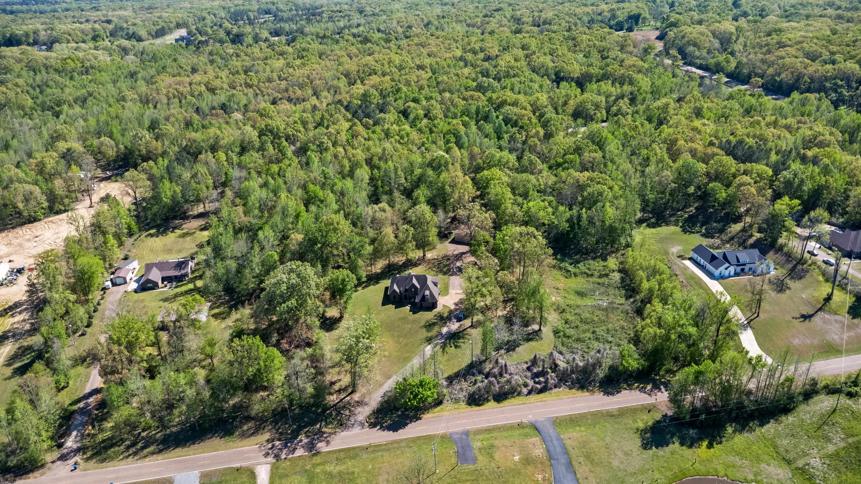 1795 Gaines Road Hernando, MS 38632 - Photo 38 of 40 an aerial view of residential house with outdoor space and trees all around