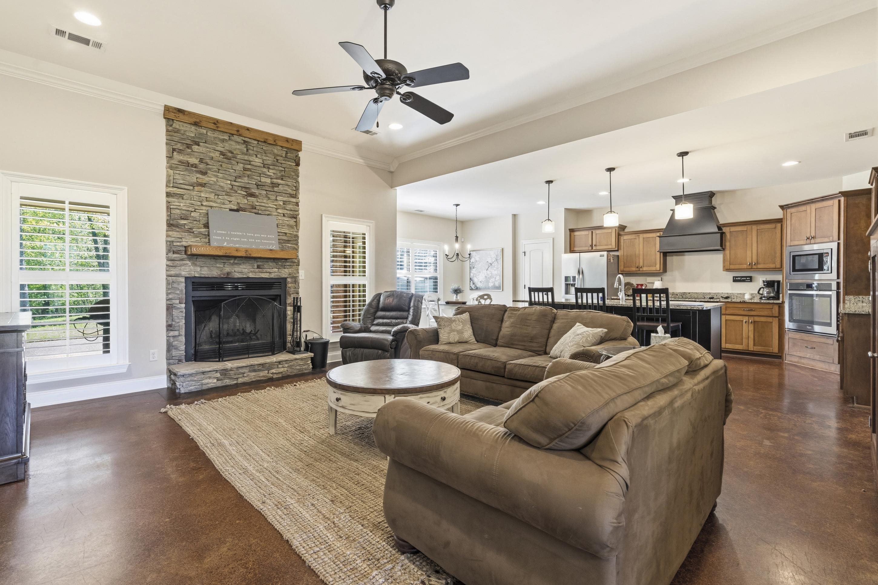1795 Gaines Road Hernando, MS 38632 - Photo 6 of 40 a living room with furniture flat screen tv and fireplace
