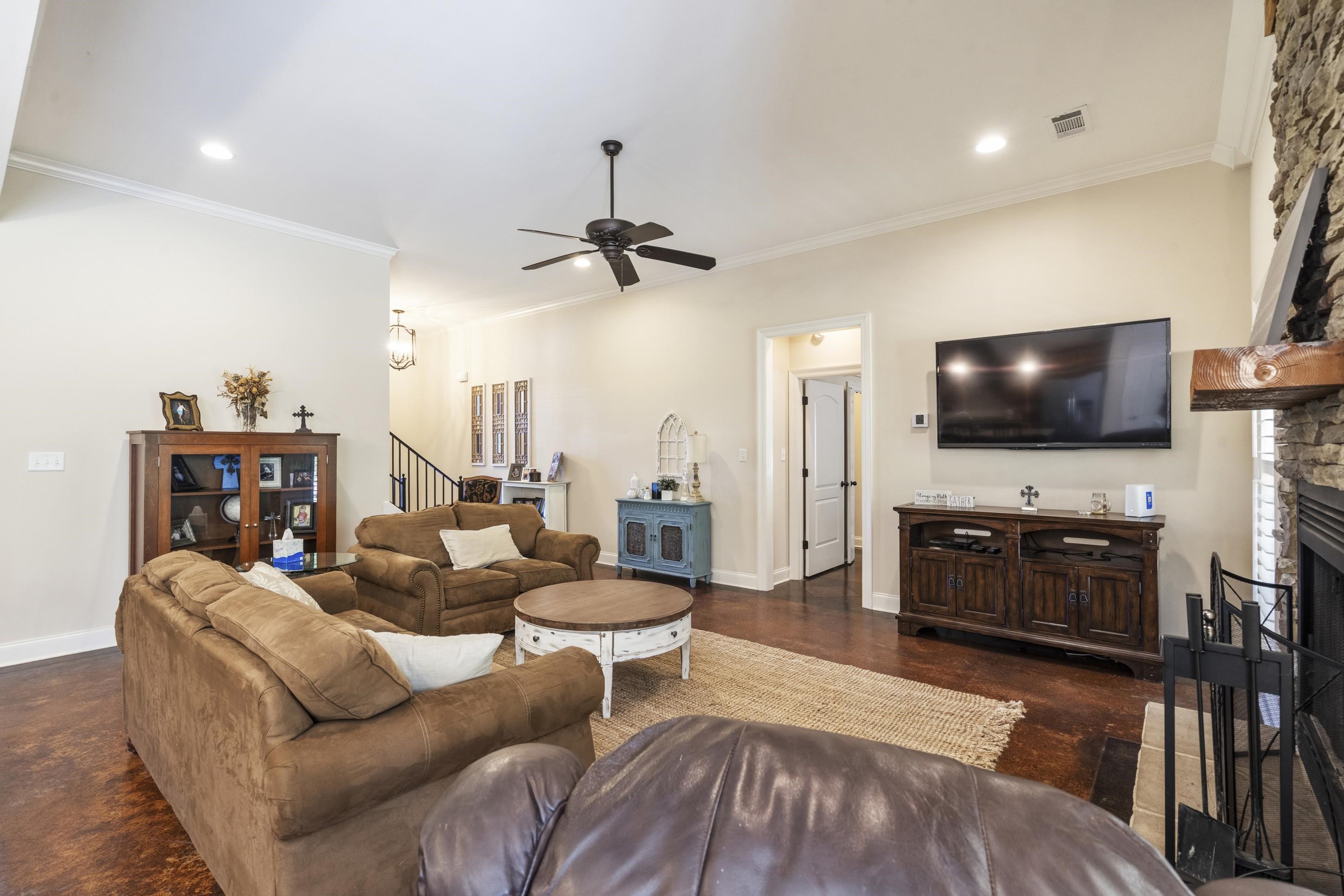 1795 Gaines Road Hernando, MS 38632 - Photo 8 of 40 a living room with furniture and a flat screen tv