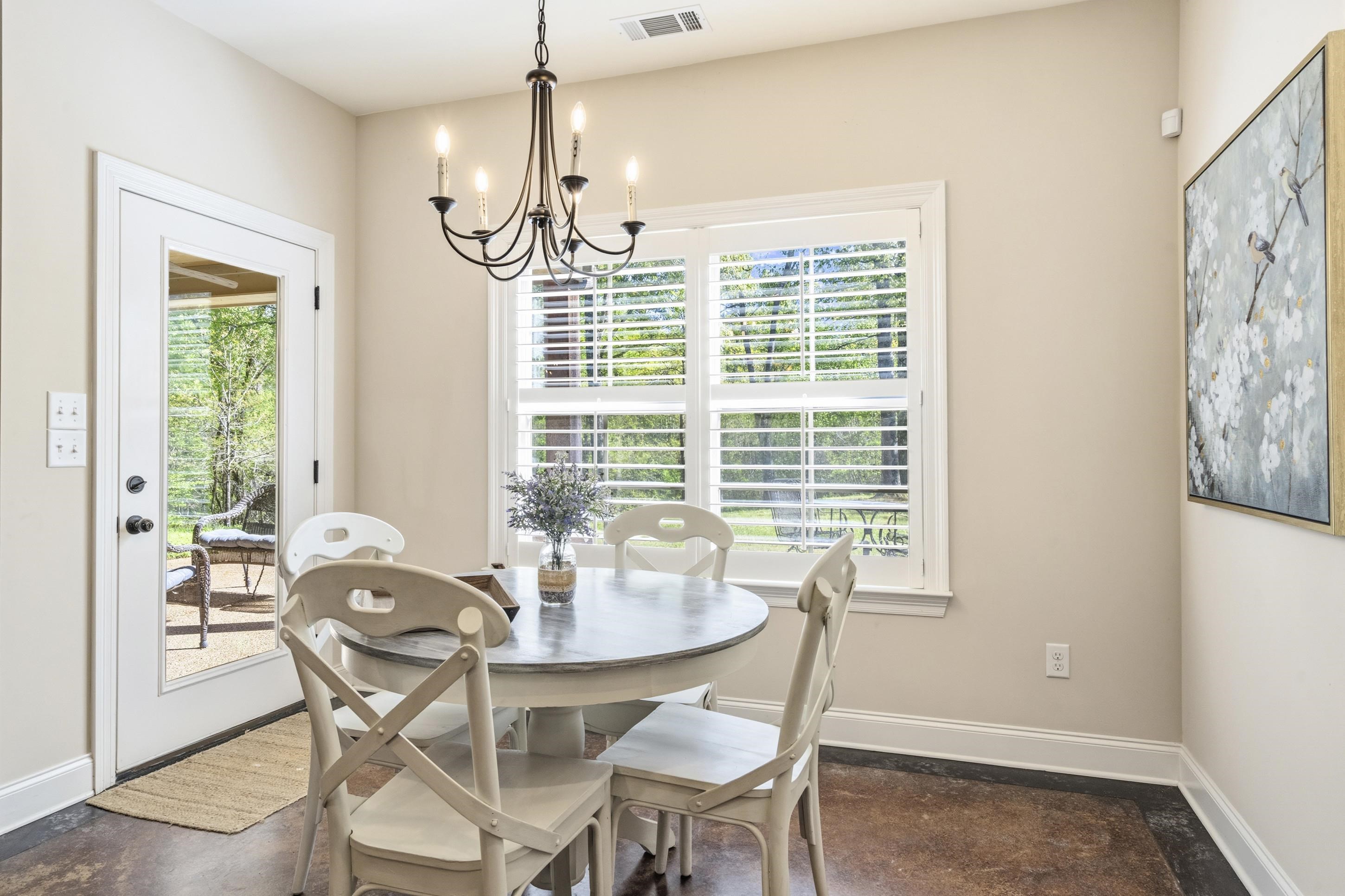 1795 Gaines Road Hernando, MS 38632 - Photo 9 of 40 a view of a dining room with furniture window and outside view