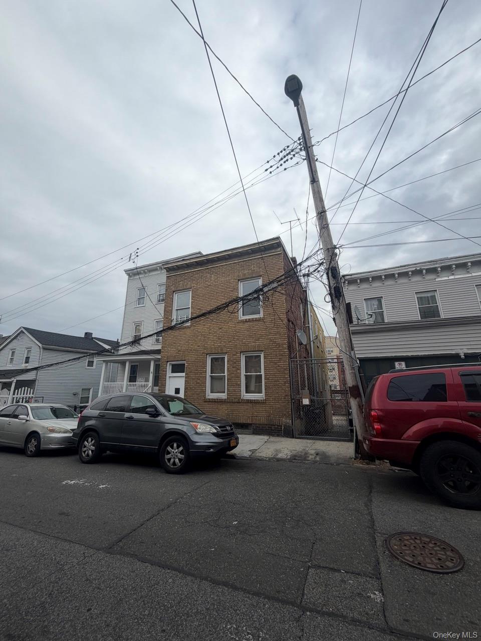 4 Ritters Lane, Unit 1 Yonkers, NY 10703 - Photo 1 of 22 a car parked in front of a building