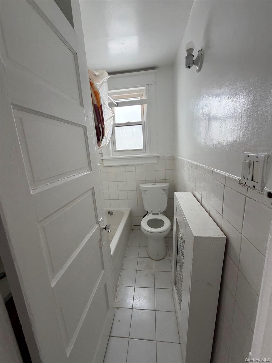 4 Ritters Lane, Unit 1 Yonkers, NY 10703 - Photo 8 of 22 a bathroom with a toilet and a sink