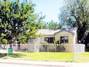5101 Crockett Street Amarillo, TX 79110 - Photo 1 of 1 a view of a house with a swimming pool