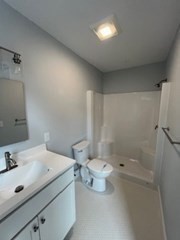 29 Orange Street, Unit B Boston, MA 02131 - Photo 17 of 23 a bathroom with a sink toilet and shower